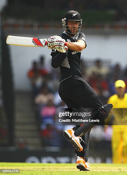 Daniel Vettori of New Zealand pulls the ball towards the boundary during the 2011 ICC World Cup Group A match between Australia and New Zealand at...