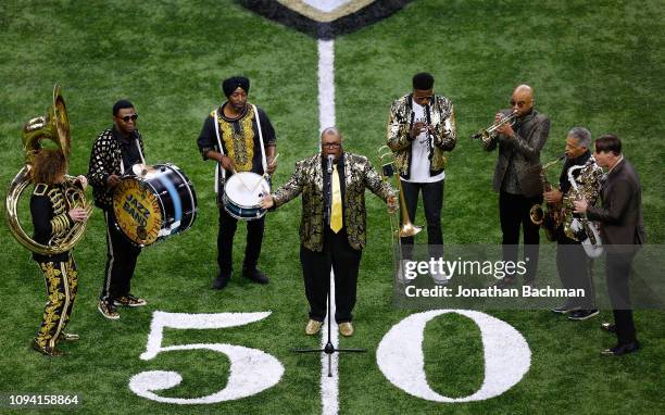 The Preservation Hall Jazz Band performs the National Anthem before the NFC Divisional Playoff between the New Orleans Saints and the Philadelphia...