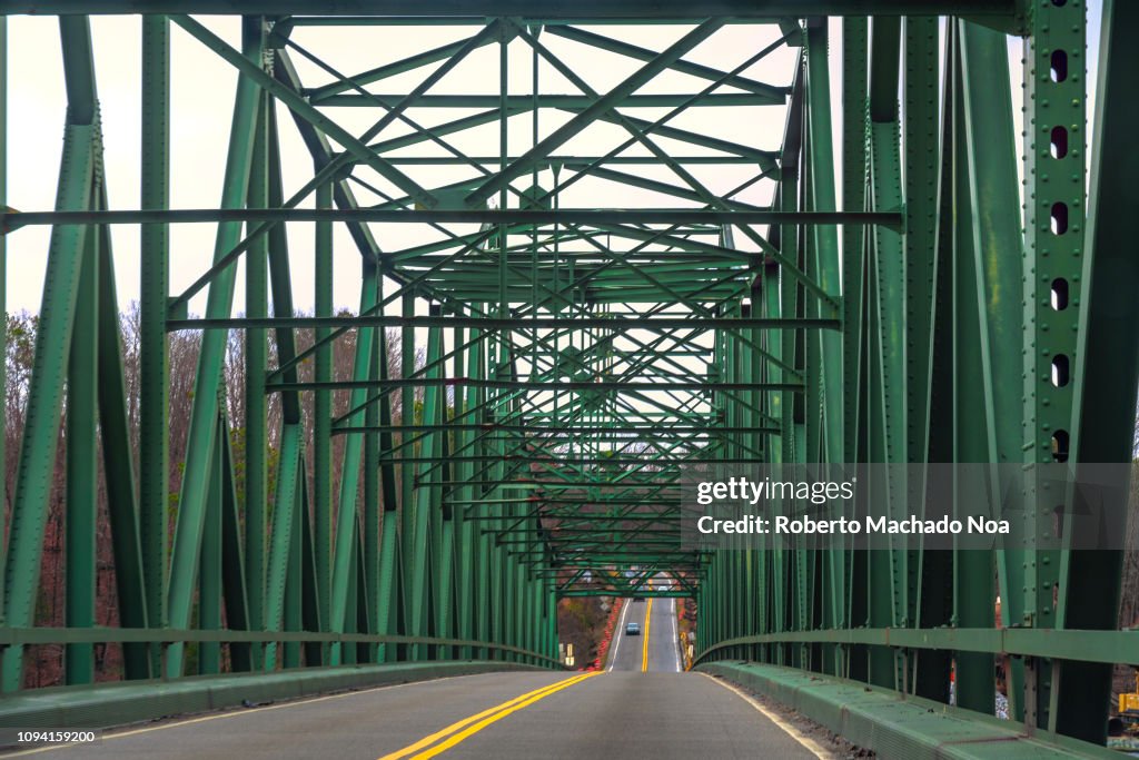 Pattern on an old metallic bridge seen on a rural road in...