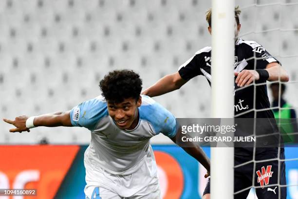 Marseille's French defender Boubacar Kamara celebrates after scoring a goal during the French L1 football match between Olympique de Marseille and FC...