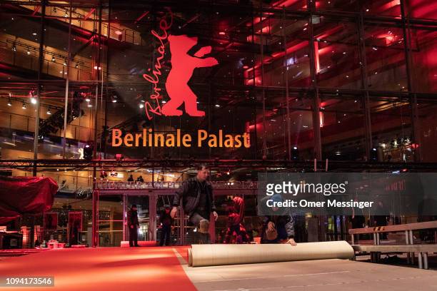 Workers roll out the red carpet at the Berlinale Palace prior to the 69th Berlinale International Film Festival on February 5, 2019 in Berlin,...