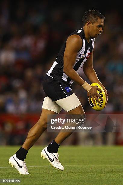 Andrew Krakouer of the Magpies kicks during the NAB Cup Quarter Final match between the Collingwood Magpies and the Sydney Swans at Etihad Stadium on...