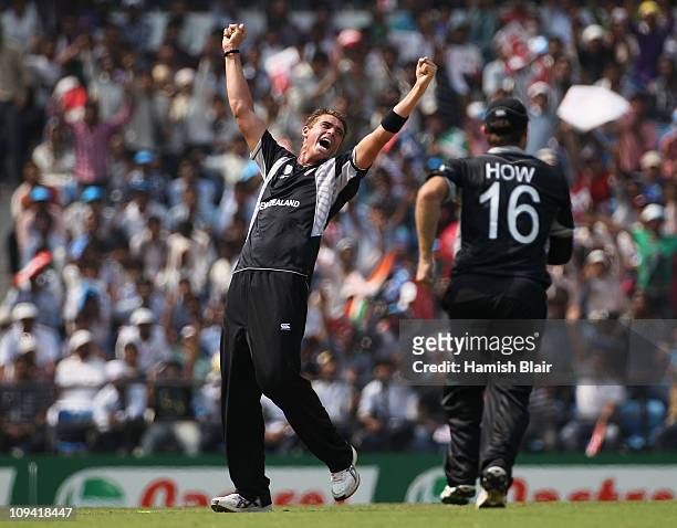 Tim Southee of New Zealand celebrates as Shane Watson of Australia is ruled out LBW, however the decision was reversed to not out on review during...