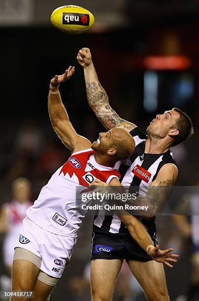 Dane Swan of the Magpies spoils a mark by Jarrad McVeigh of the Swans during the NAB Cup Quarter Final match between the Collingwood Magpies and the...