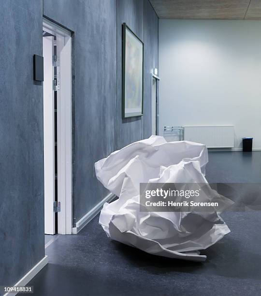 giant crumpled up paper waste lying in office - too big stock pictures, royalty-free photos & images