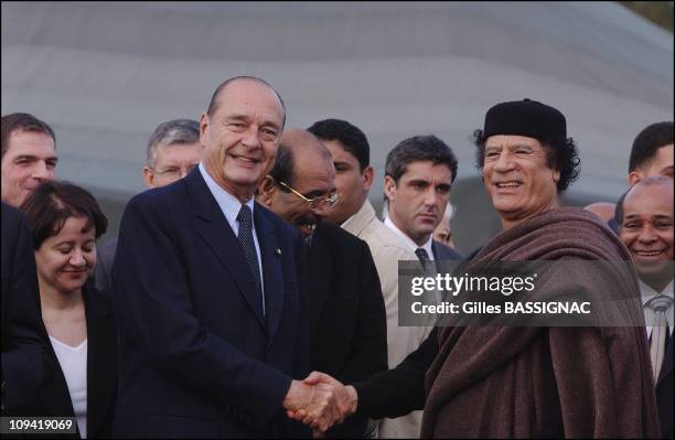 Jacques Chirac meets with Muammar Gaddafi on a visit to Libya in 2004