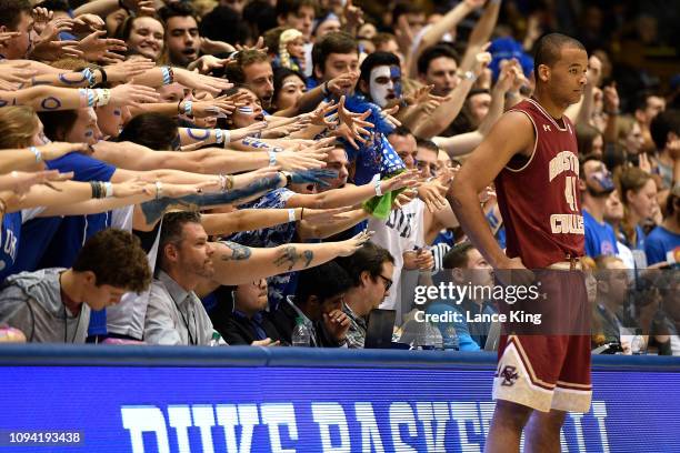 Cameron Crazies and fans of the Duke Blue Devils taunt Steffon Mitchell of the Boston College Eagles in the second half at Cameron Indoor Stadium on...