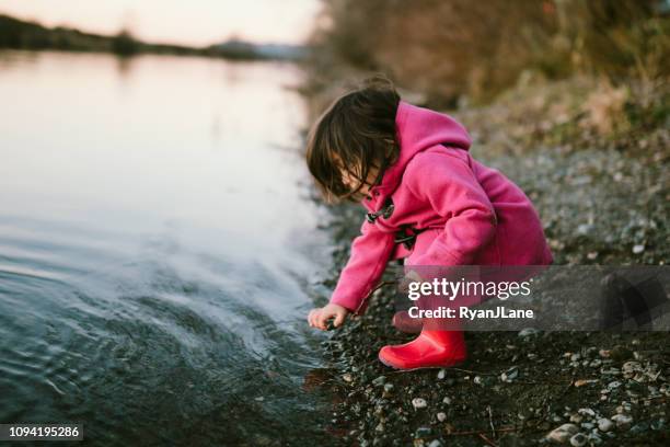 797 Kids Throwing Rocks Stock Photos, High-Res Pictures, and Images ...