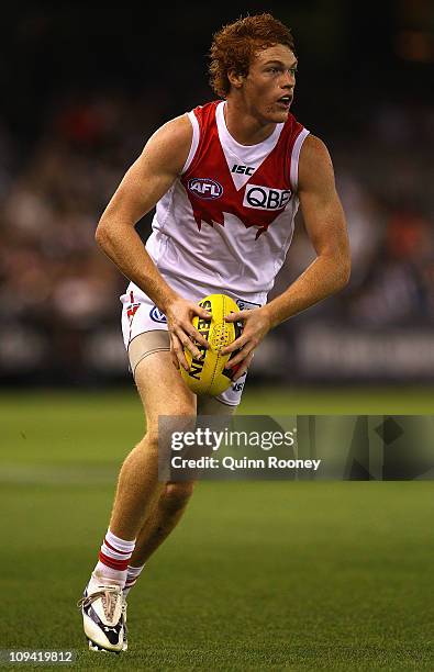 Gary Rohan of the Swans kicks during the NAB Cup Quarter Final match between the Collingwood Magpies and the Sydney Swans at Etihad Stadium on...