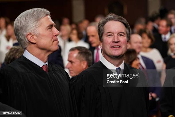 Supreme Court Justices Neil Gorsuch and Brett Kavanaugh attend the State of the Union address in the chamber of the U.S. House of Representatives at...