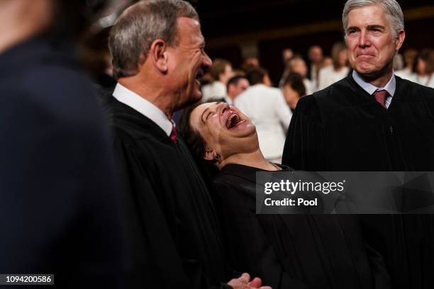 Supreme Court Justices John Roberts, Elena Kagan and Neil Gorsuch attend the State of the Union address in the chamber of the U.S. House of...