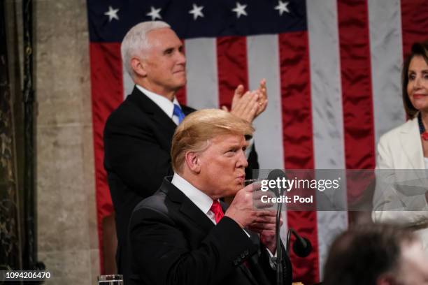 President Donald Trump, with Speaker Nancy Pelosi and Vice President Mike Pence looking on, delivers the State of the Union address in the chamber of...