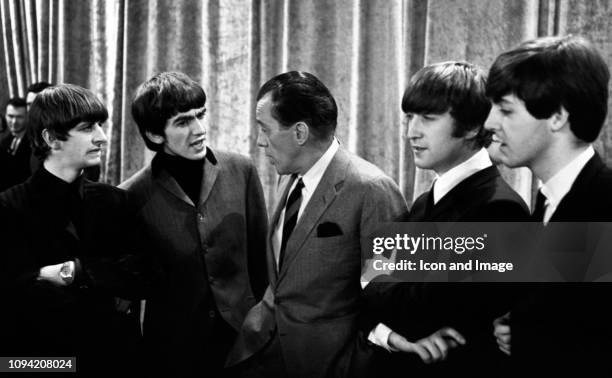 American TV host Ed Sullivan talks to English musician, singer and drummer Ringo Starr, English musician, singer-songwriter and guitarist George...