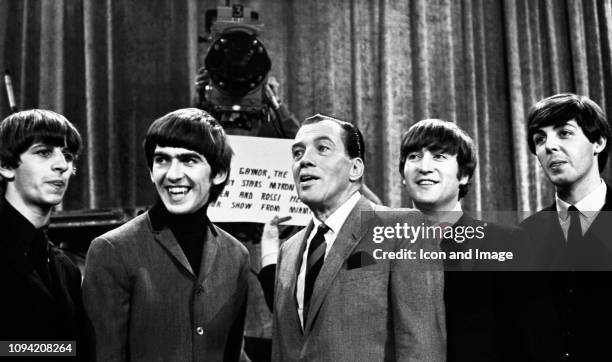 American TV host Ed Sullivan talks to English musician, singer and drummer Ringo Starr, English musician, singer-songwriter and guitarist George...