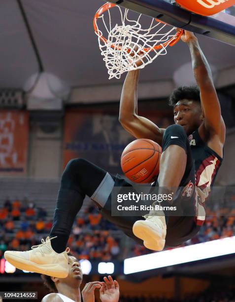 Terance Mann of the Florida State Seminoles dunks the ball against the Syracuse Orange during the second half at the Carrier Dome on February 5, 2019...