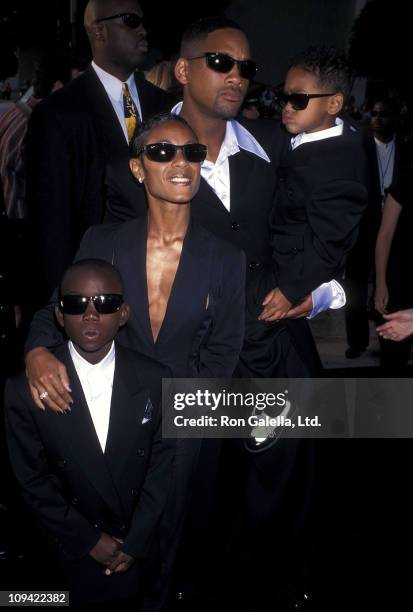 Actress Jada Pinkett, actor Will Smith, son Trey Smith and nephew attend the "Men in Black" Hollywood Premiere on June 25, 1997 at Pacific's Cinerama...