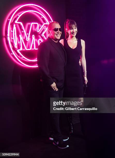 Fashion designer, chief creative officer of his brand Michael Kors and model Bella Hadid are seen at the Jump Into Spring: MICHAEL Michael Kors...