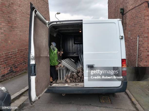 white van with open rear door - transport building stock pictures, royalty-free photos & images