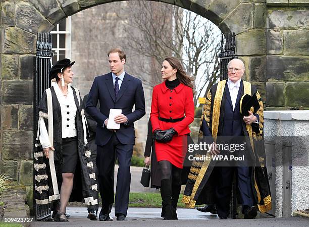 Prince William and Kate Middleton pass St Salvator's halls, accompanied by Sir Menzies Campbell during a visit to the University of St Andrews on...