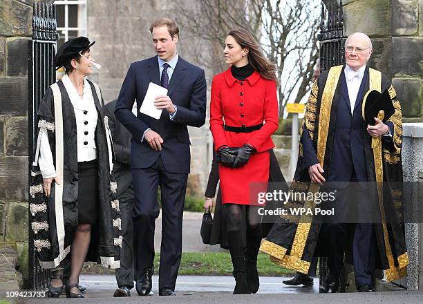 Prince William and Kate Middleton pass St Salvator's halls, accompanied by Sir Menzies Campbell during a visit to the University of St Andrews on...