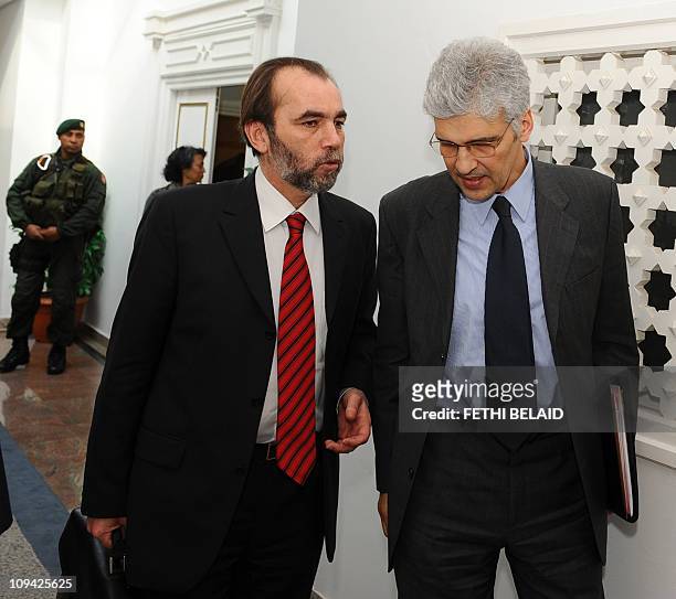 Tunisian Employment Minister Said Aydi speaks with Tunisian International Cooperation Nouri Jouini after a cabinet meeting at Carthage Palace in...