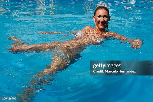 Argentine model Andrea Dellacasa, the Queen of the 52th International Song Festival, during a photo shoot in the pool of a hotel on February 25, 2011...