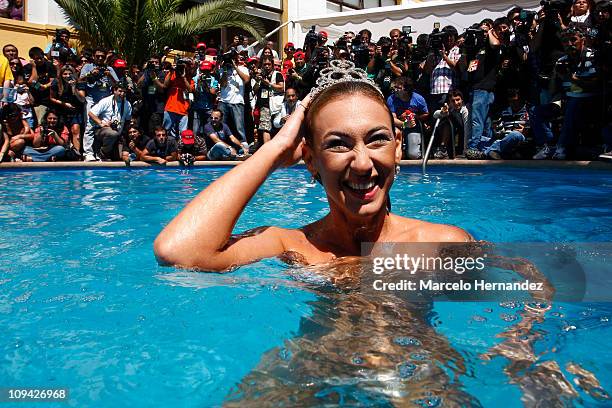 Argentine model Andrea Dellacasa, the Queen of the 52th International Song Festival, during a photo shoot in the pool of a hotel on February 25, 2011...