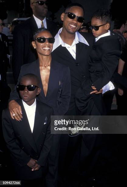 Actress Jada Pinkett, actor Will Smith, son Trey Smith and nephew attend the "Men in Black" Hollywood Premiere on June 25, 1997 at Pacific's Cinerama...