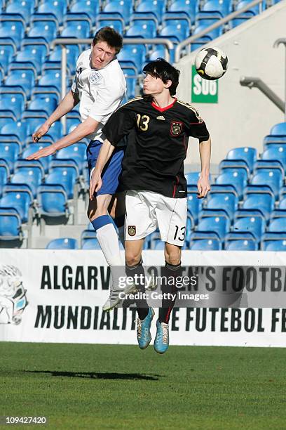 John Lundstram of U17 England challenges Sven Mende of U17 Germany during the international friendly match between U17 England and U17 Germany at the...