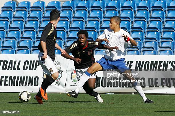 Jordan Cousins of U17 England challenges Erich Berko of U17 Germany during the international friendly match between U17 England and U17 Germany at...