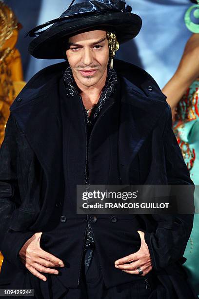 British designer John Galliano acknowledges the public at the end of Christian Dior Spring/Summer 2008 Haute Couture collection show in Paris, 21...