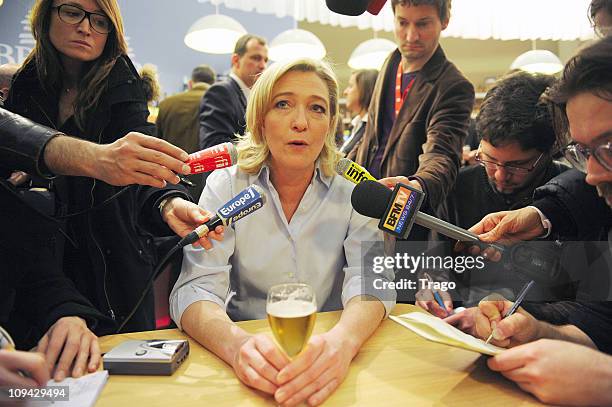 President of the National Front Party Marine Le Pen Visits Salon de l'Agriculture at Parc des Expositions Porte de Versailles on February 25, 2011 in...