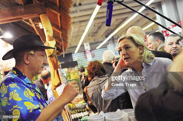 President of the National Front Party Marine Le Pen Visits Salon de l'Agriculture at Parc des Expositions Porte de Versailles on February 25, 2011 in...