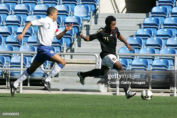 Jordan Cousins of U17 England challenges Erich Berko of U17 Germany during the international friendly match between U17 England and U17 Germany at...