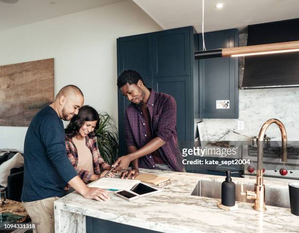 multiracial family getting home consultation - real estate agent stock pictures, royalty-free photos & images