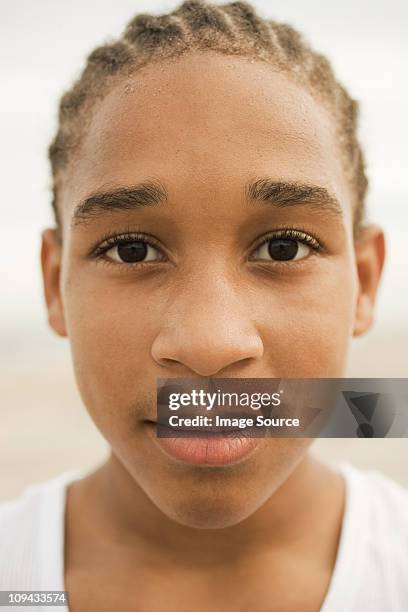 head and shoulders portrait of boy - african cornrow braids stock pictures, royalty-free photos & images