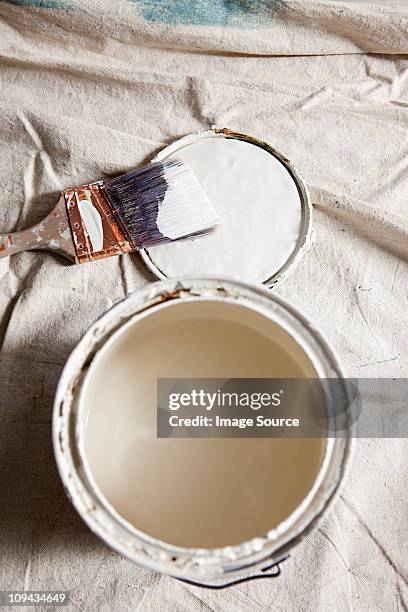 open paint tin with white paint - diy top view stock pictures, royalty-free photos & images