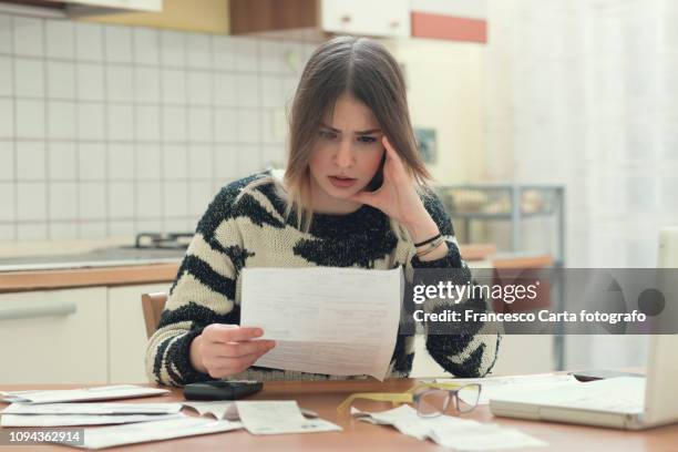 tax time - woman worried bildbanksfoton och bilder