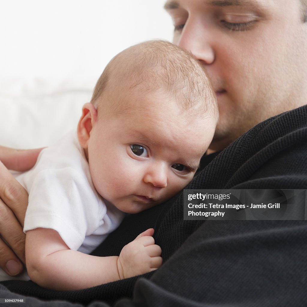 USA, New Jersey, Jersey City, Portrait of father and baby daughter (2-5 months)