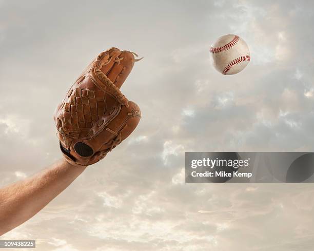 usa, utah, lehi, hand of baseball player catching baseball - lehi stock pictures, royalty-free photos & images