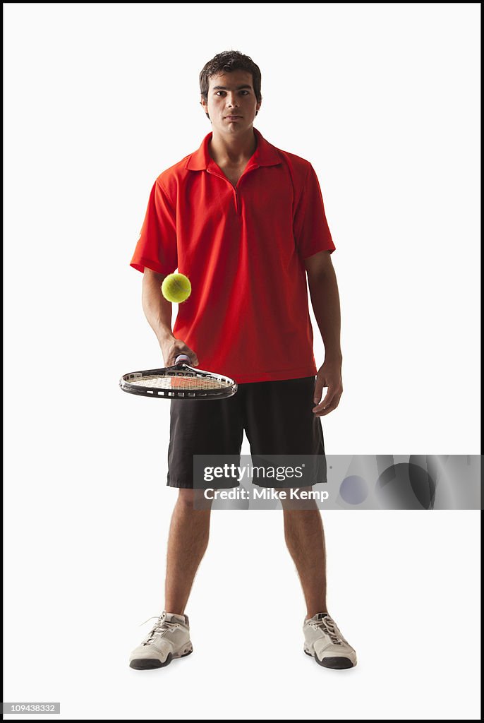 Young man playing tennis