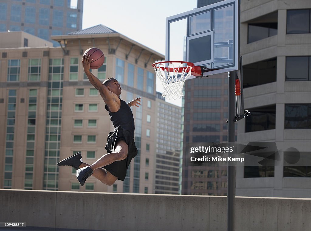 USA, Utah, Salt Lake City, man playing basketball