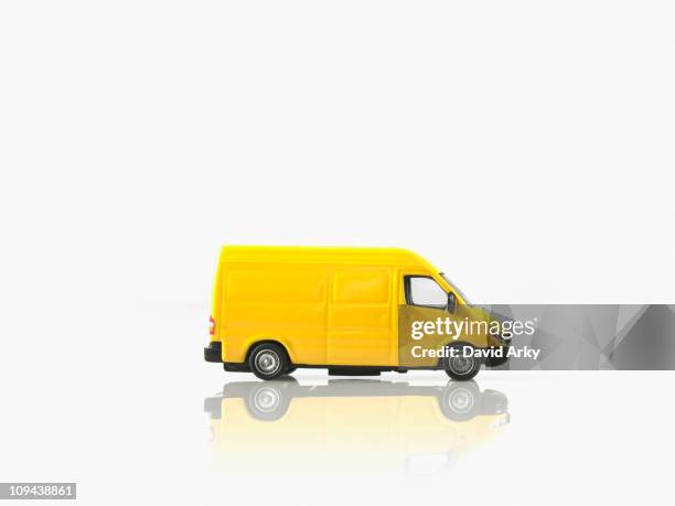studio shot of toy car - speelgoedauto stockfoto's en -beelden