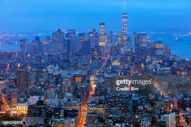 new york, manhattan, skyline at night - liberty island stock pictures, royalty-free photos & images