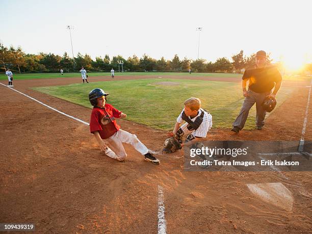 USA, California, Ladera Ranch, boys (10-11) playing baseball