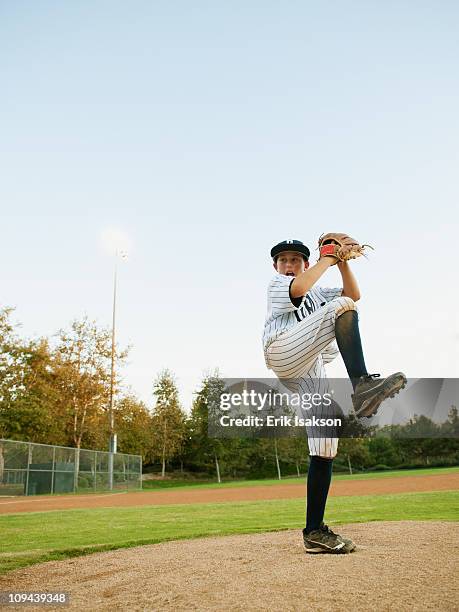 usa, california, ladera ranch, boy (10-11) playing baseball - kid baseball pitcher stock pictures, royalty-free photos & images