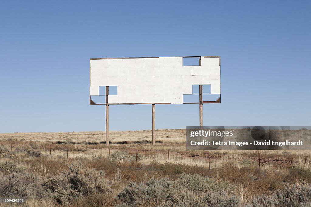 USA, Arizona, Winslow, Blank billboard against blue sky