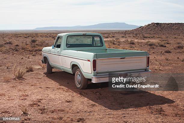 usa, arizona, winslow, pick-up truck on desert - pick up truck stock pictures, royalty-free photos & images