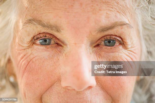 portrait of senior woman - human nose stockfoto's en -beelden