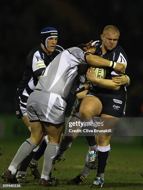 Lee Imiolek of Sale Sharks in action with Julian White and Marcos Ayerza of Leicester Tigers during the AVIVA Premiership match between Sale Sharks...